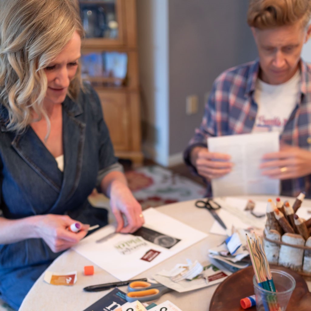 Participants creating personalized vision boards based on their astrological signs during Angel Living’s free workshop.